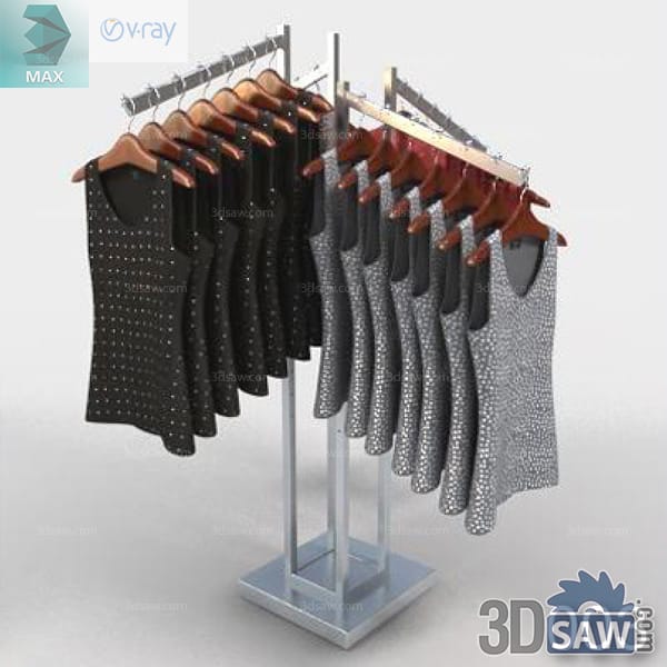 Freestanding metal retail rack with black and grey patterned dresses