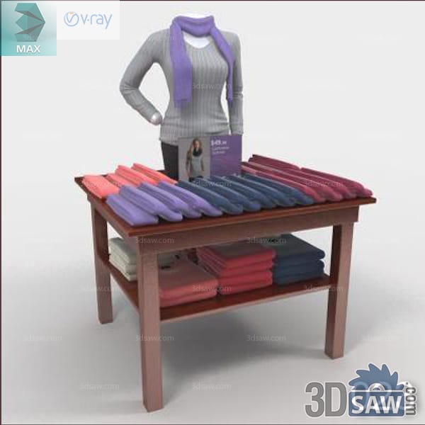 Scarf-wearing torso mannequin behind a wood table of folded colorful accessories