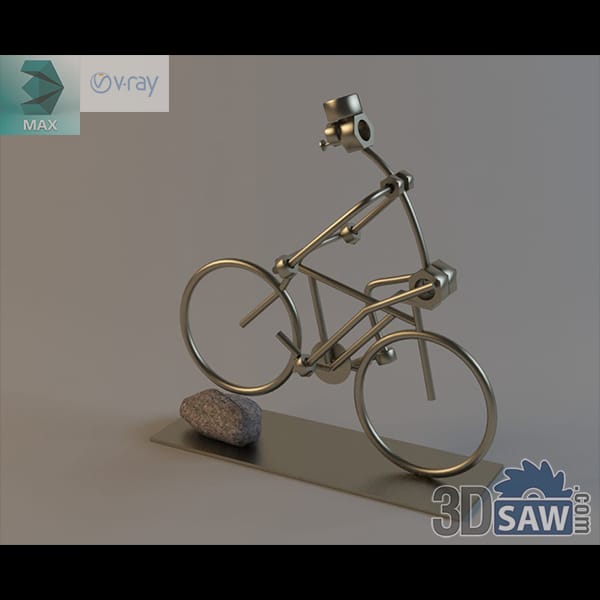 Scrap-metal wire bicycle rider figurine on a stone-set base