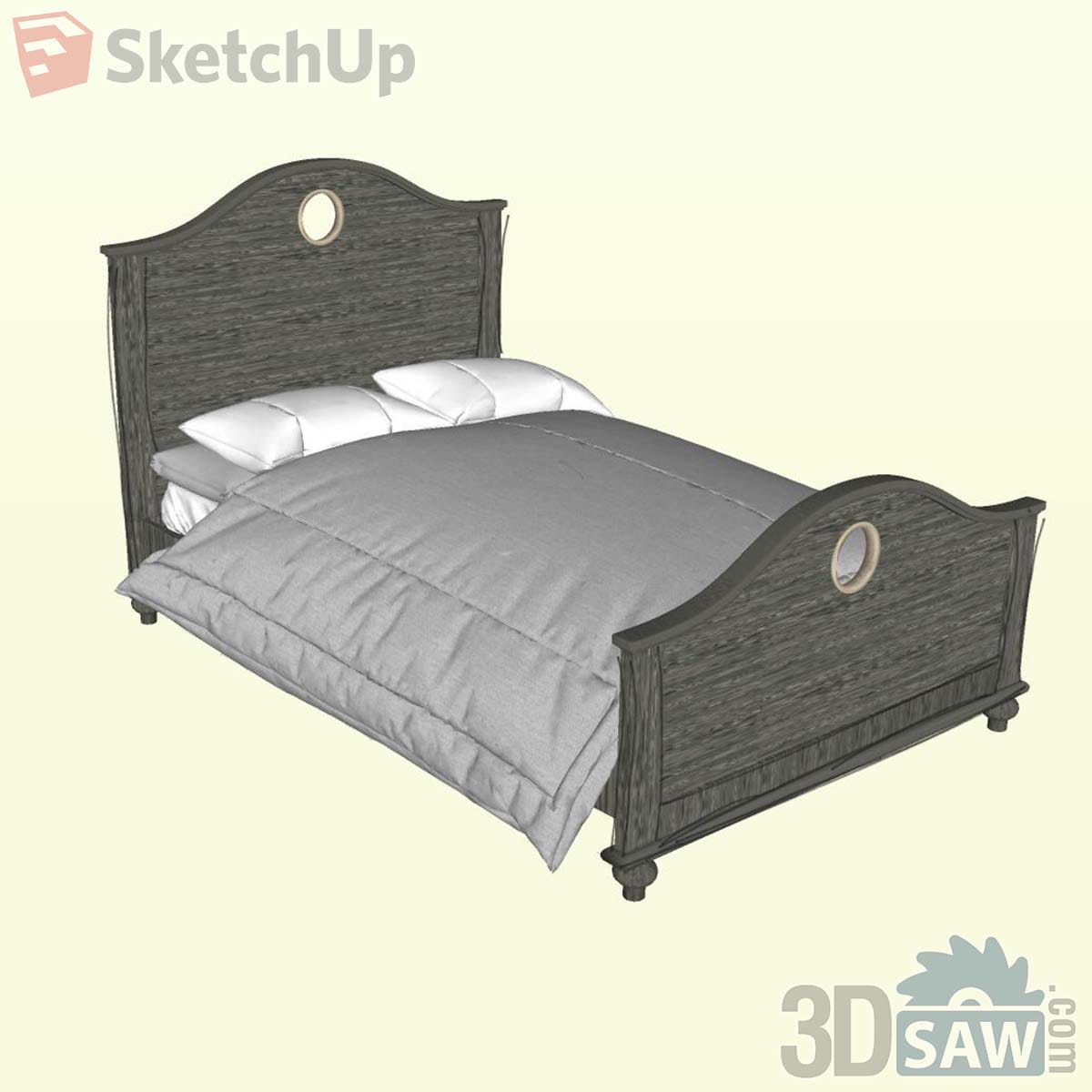 Weathered grey wood bed with arched headboard and footboard featuring round porthole cut-outs