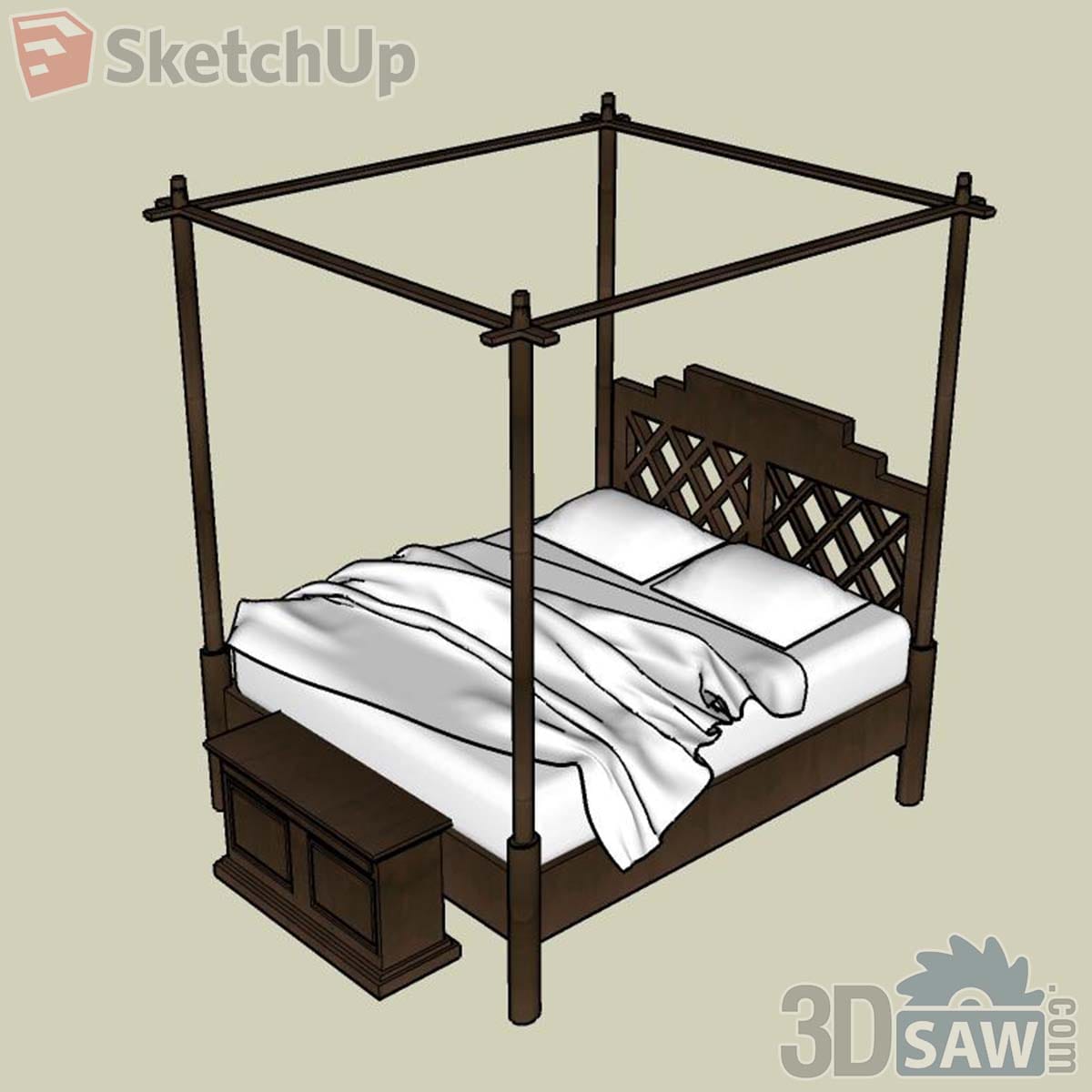 Dark wood four-poster bed with lattice headboard, white bedding and a blanket chest at the foot